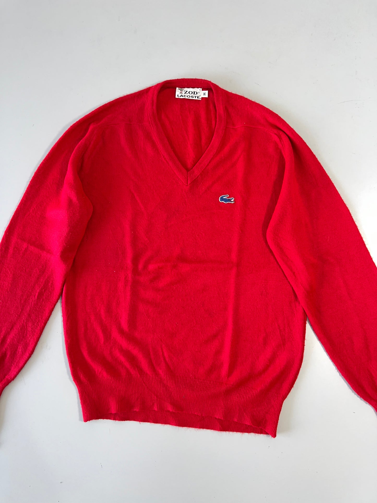 !                                                                                                                  *Lacoste Pullover (M)