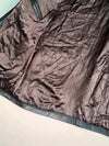 The label  "Genuine Leather" with an eagle (XL)
