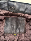 The label  "Genuine Leather" with an eagle (XL)