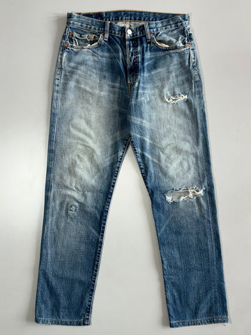 Vintage Levi’s 501 Distressed Blue Denim Jeans (W:30|L:40)