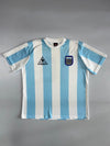 Le Coq Sportif | Argentina AFA Home Football Jersey | Sky Blue & White Stripes (XL)