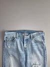 Vintage Levi’s 501 T Tapered Light Wash Distressed Ripped Jeans (W:33) (L:37)
