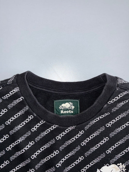 Roots Canada | All-Over Logo Print Crewneck Sweatshirt | Black (L)