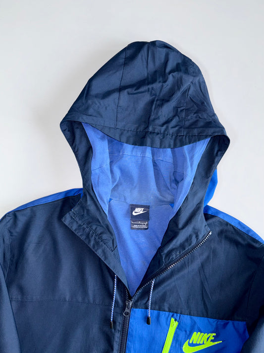 Vintage Nike’s Premium Zip-Up Hooded Track Jacket (L)
