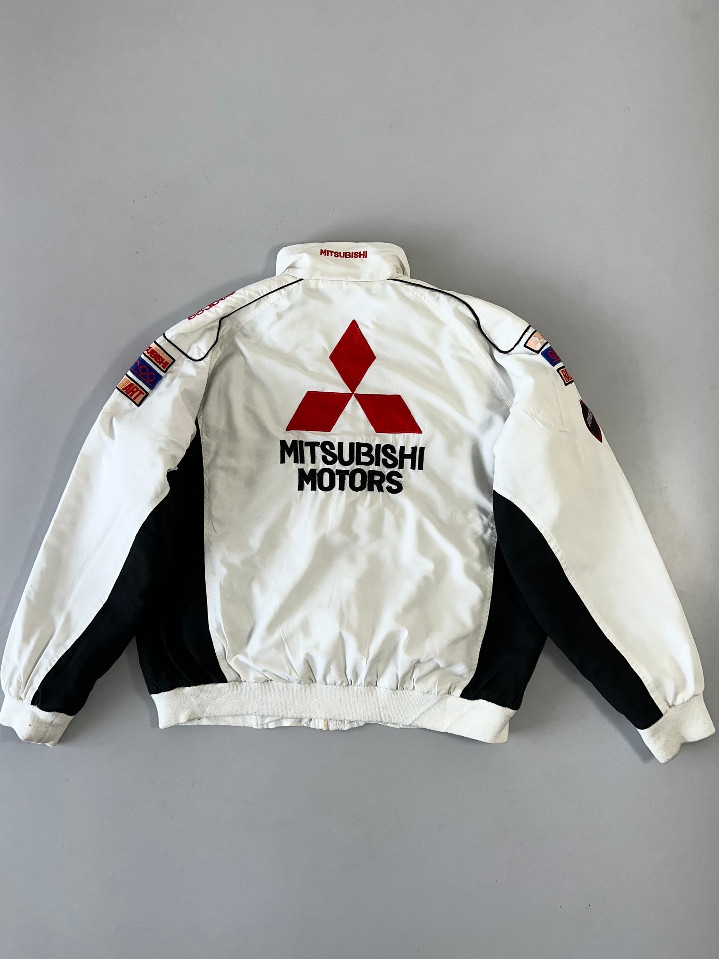 !                                                                                                                                                                      Mitsubishi Motors Racing Jacket (L)