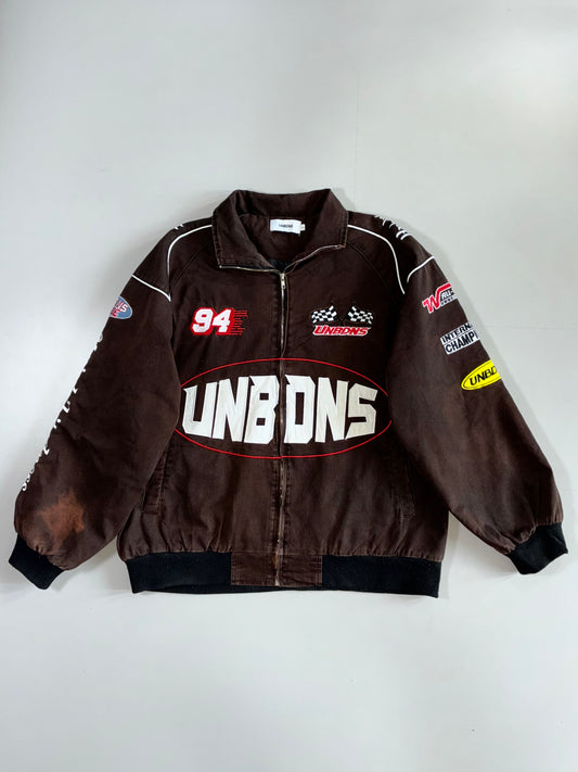 UNBDNS International Champions #94 Checkered Flag Multi-Patch Embroidered Brown Bomber Jacket (L/XL)