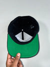 The black snapback with "Studieren Kann Jeder" (Adjustable)
