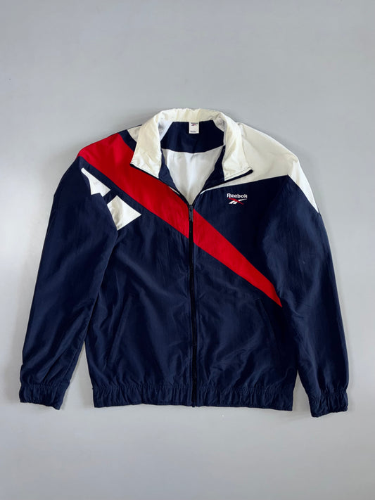 Vintage 90s Reebok Colorblock Windbreaker Jacket | Navy Blue Red White Diagonal Stripe Track Top (L)