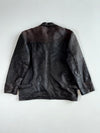 The label  "Genuine Leather" with an eagle (XL)