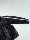 The label  "Genuine Leather" with an eagle (XL)
