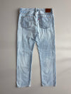Vintage Levi’s 501 T Tapered Light Wash Distressed Ripped Jeans (W:33) (L:37)