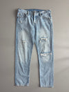 Vintage Levi’s 501 T Tapered Light Wash Distressed Ripped Jeans (W:33) (L:37)