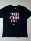 Adidas “Three Stripe Life” USA Flag Graphic Tee – Black (L)