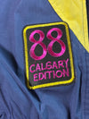 Vintage 90s Umbro "88 Calgary Edition" Windbreaker Track Jacket – (2XL/3XL)