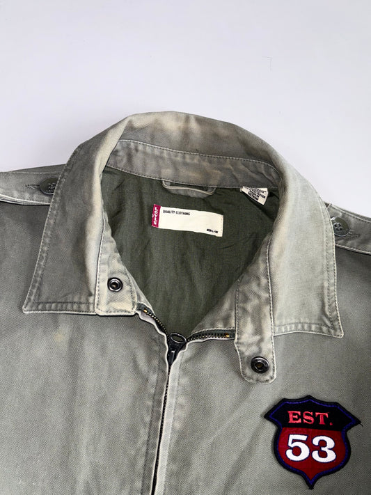 Vintage Levi’s EST. 53 Patch Military Harrington Jacket | Faded Olive Green | Ribbed Hem | Embroidered Patches (L)